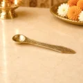 Premium brass pooja spoon with engraved floral handle for Panchpatra, Gangajal, Panchamrit, Jal Abhishek and daily worship.
