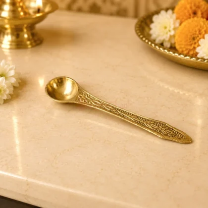 Premium brass pooja spoon with engraved floral handle for Panchpatra, Gangajal, Panchamrit, Jal Abhishek and daily worship.
