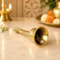 Premium pure brass Garuda pooja bell with traditional ghanti design for home temple, aarti, daily worship and religious ceremonies.