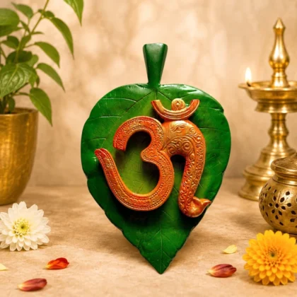 Premium Om Ganesha wall hanging on sacred Peepal leaf for home temple, office, meditation, prayer and vastu decoration.